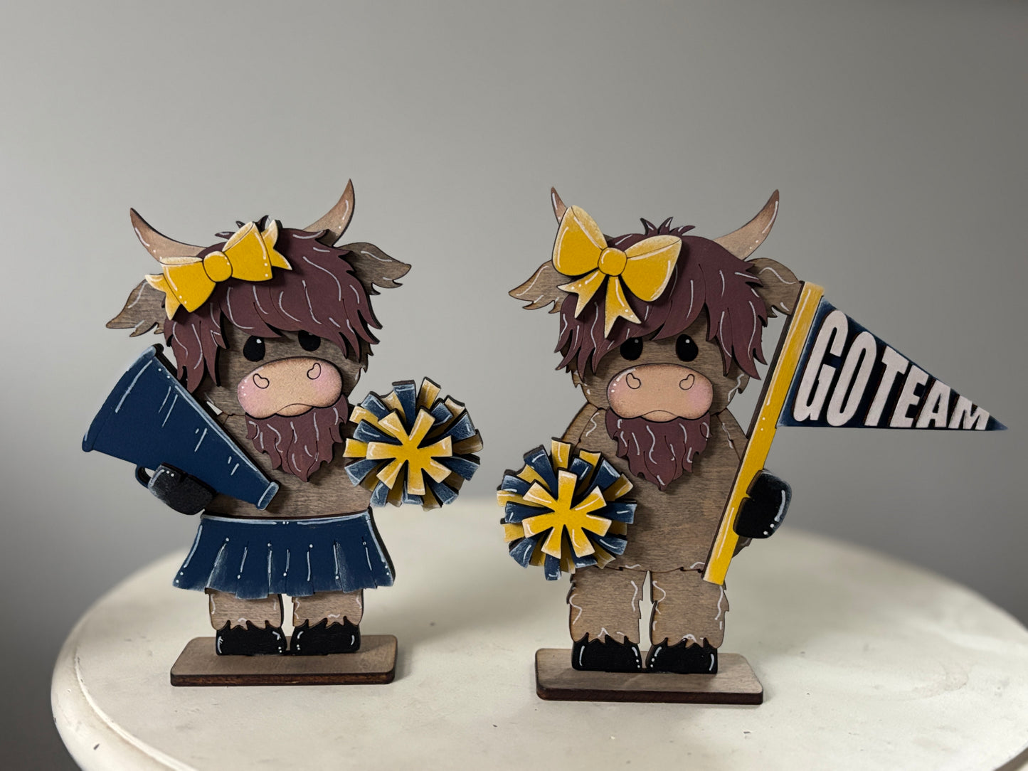 Mini standing highland cows- football & cheer