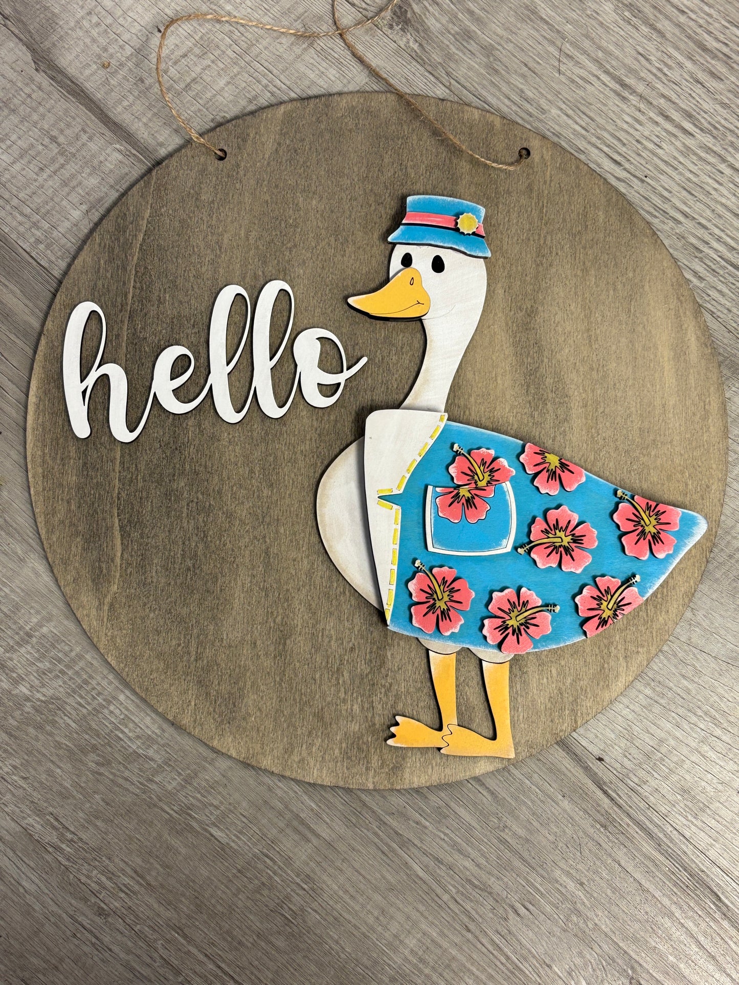 Interchangeable goose door hanger