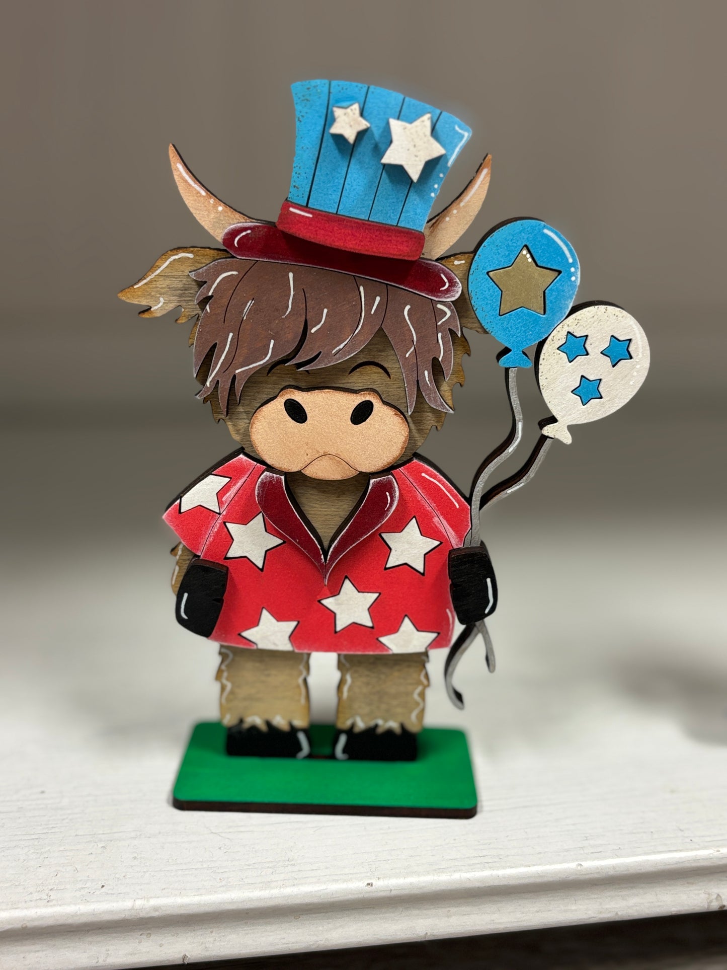 Mini standing patriotic highland cows