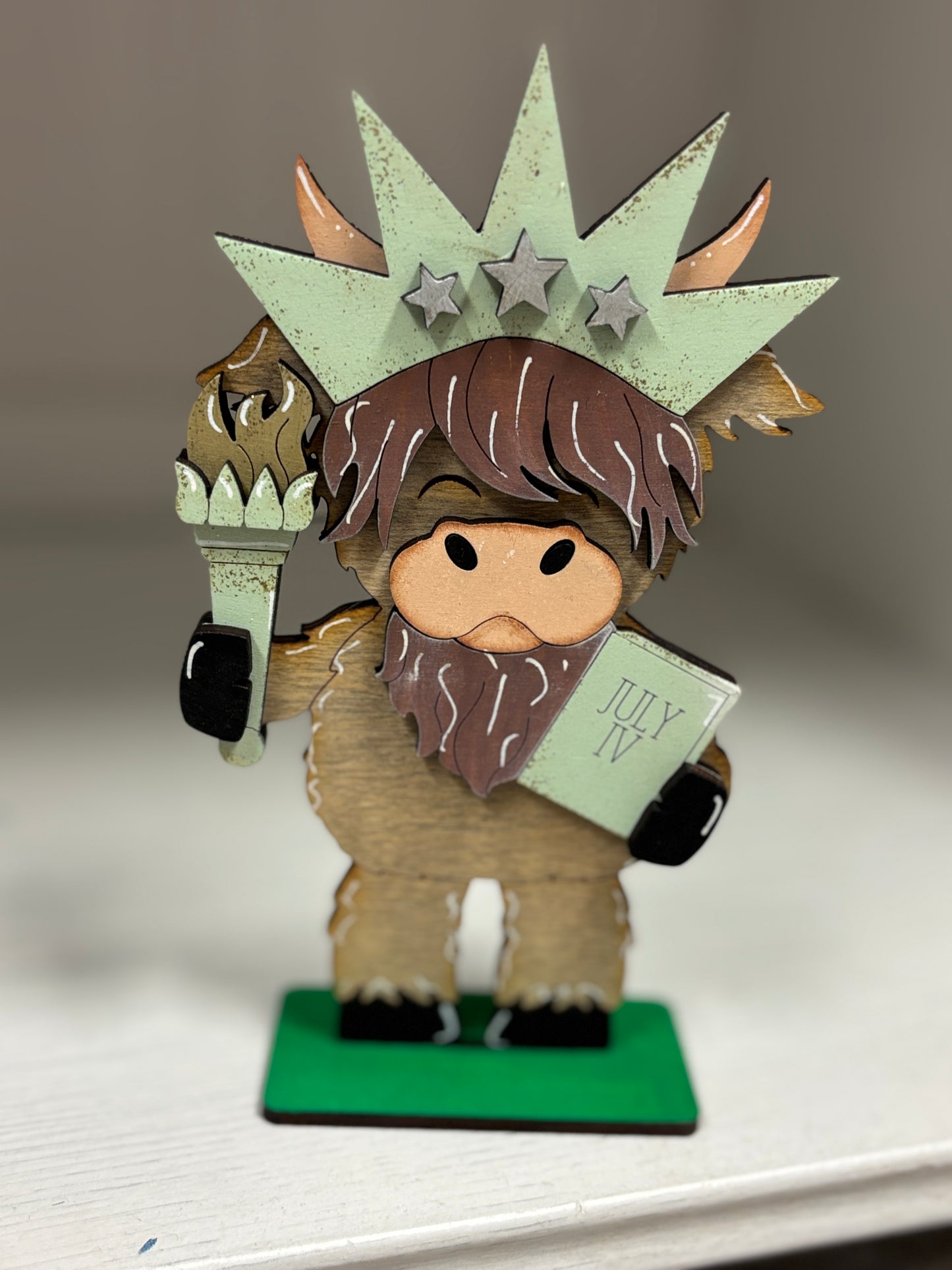 Mini standing patriotic highland cows