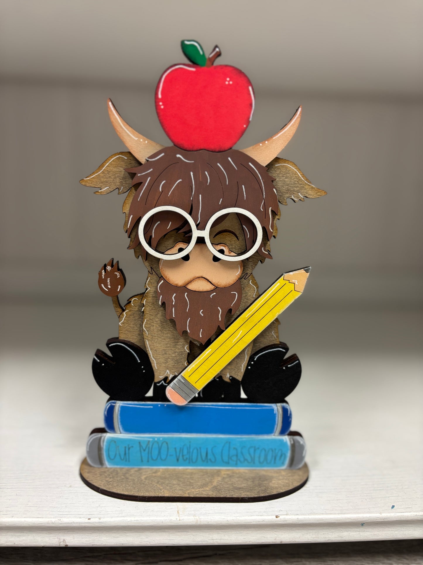 Mini standing highland cow- school teacher