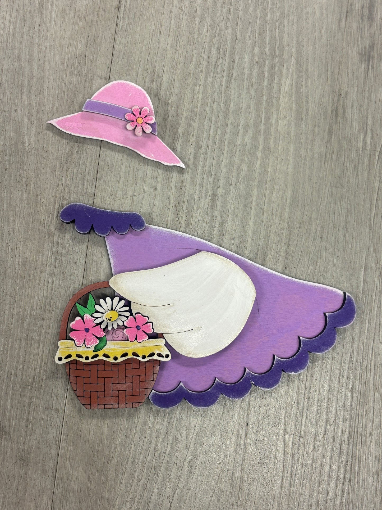 Interchangeable goose door hanger