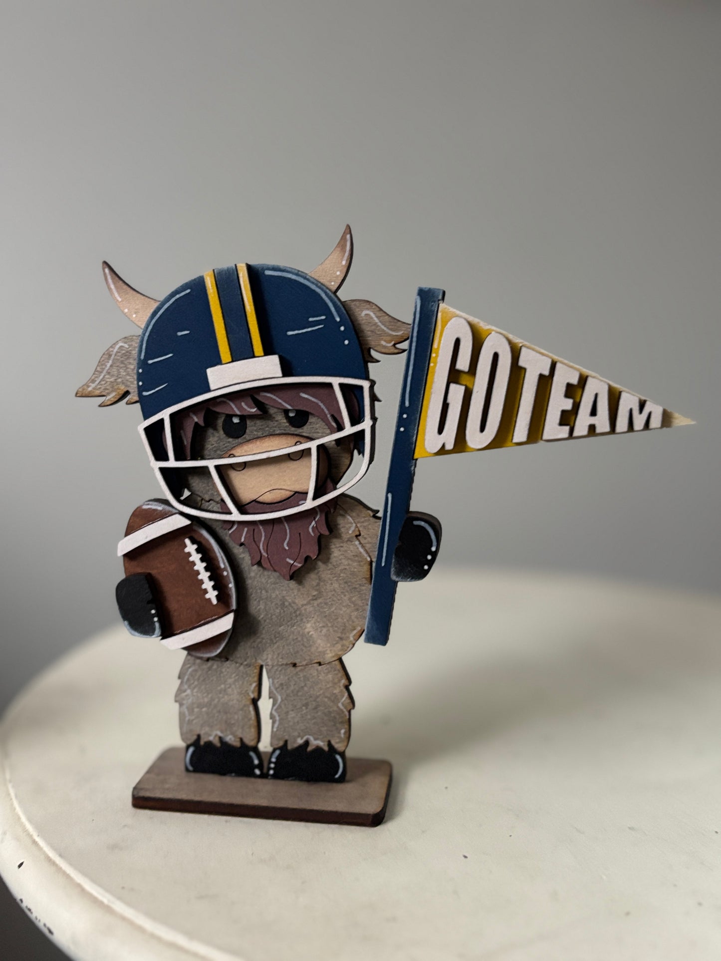Mini standing highland cows- football & cheer
