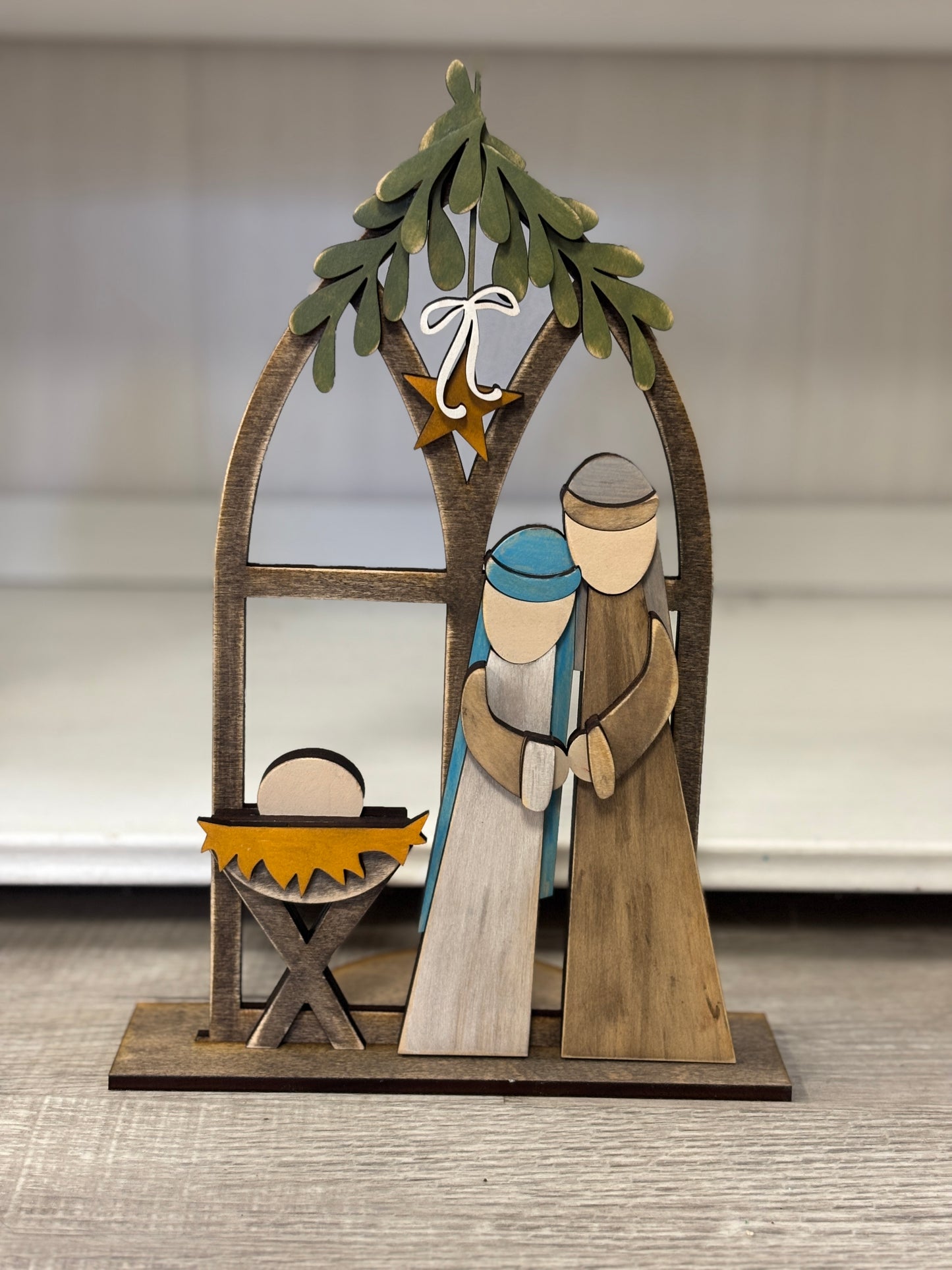 Standing nativity window scene