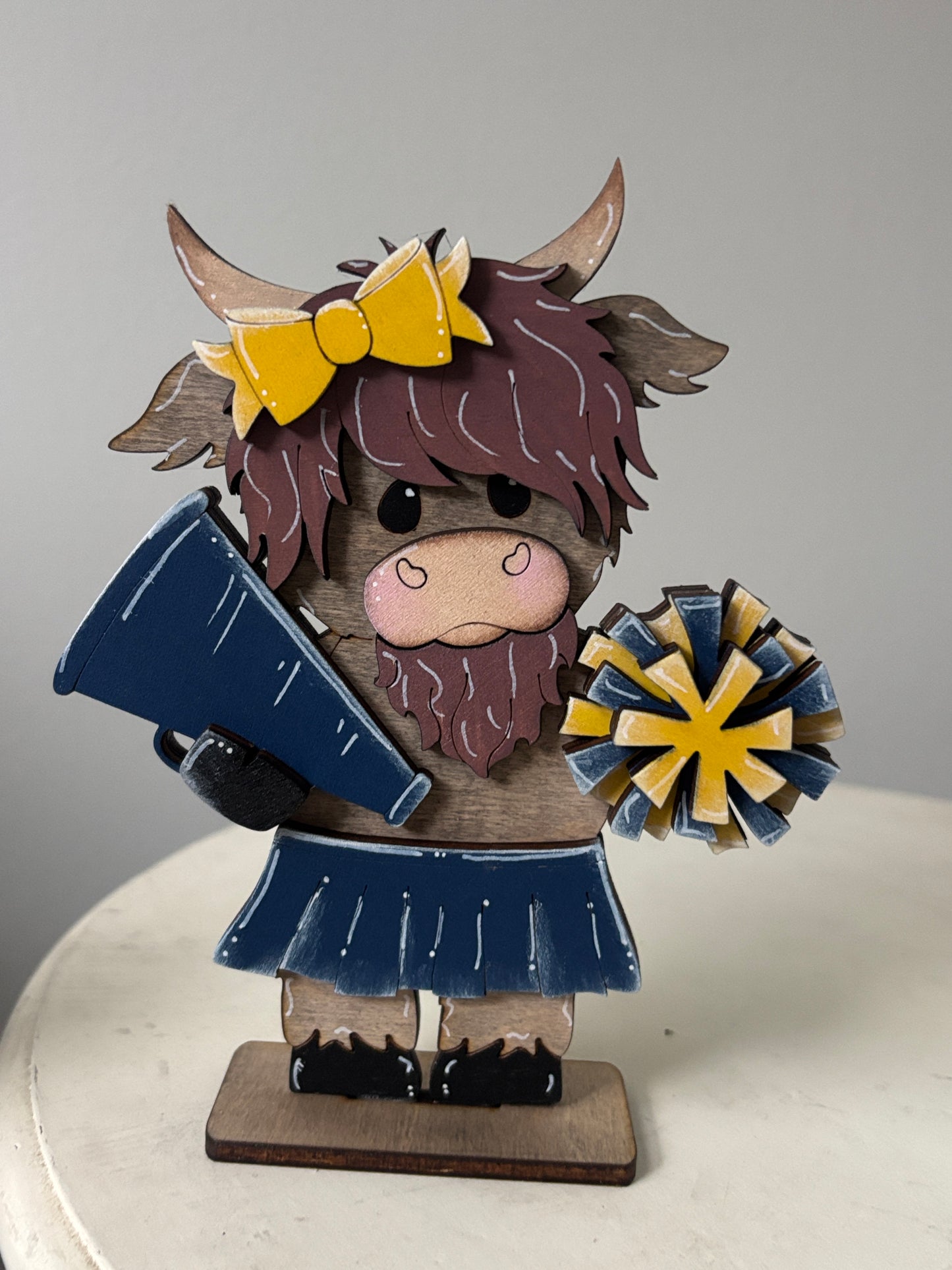Mini standing highland cows- football & cheer