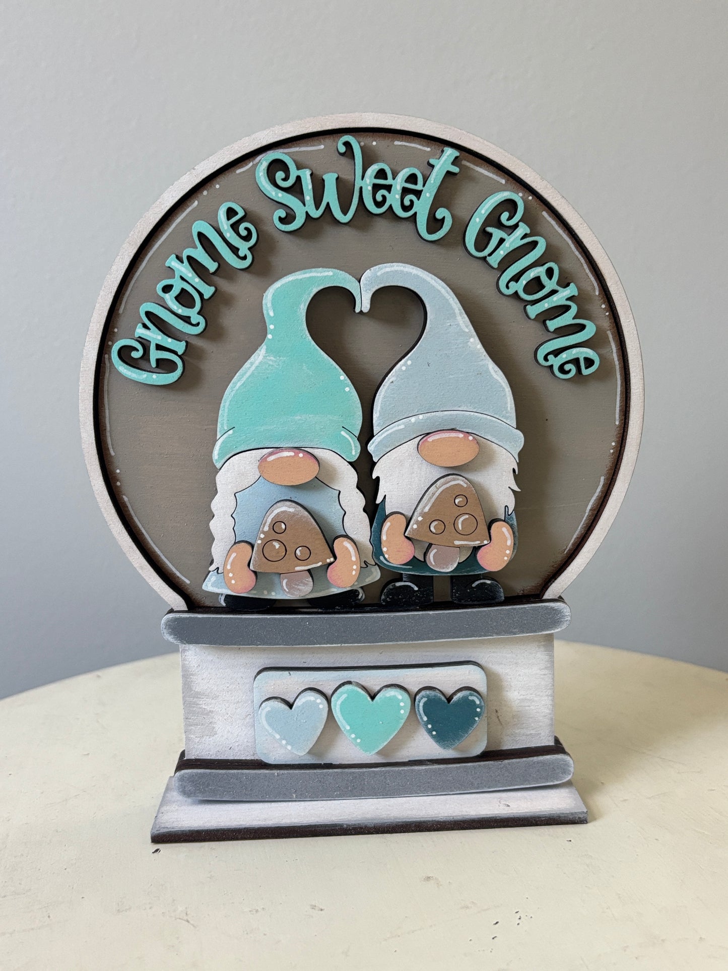Interchangeable snow globe and inserts (sold separately)