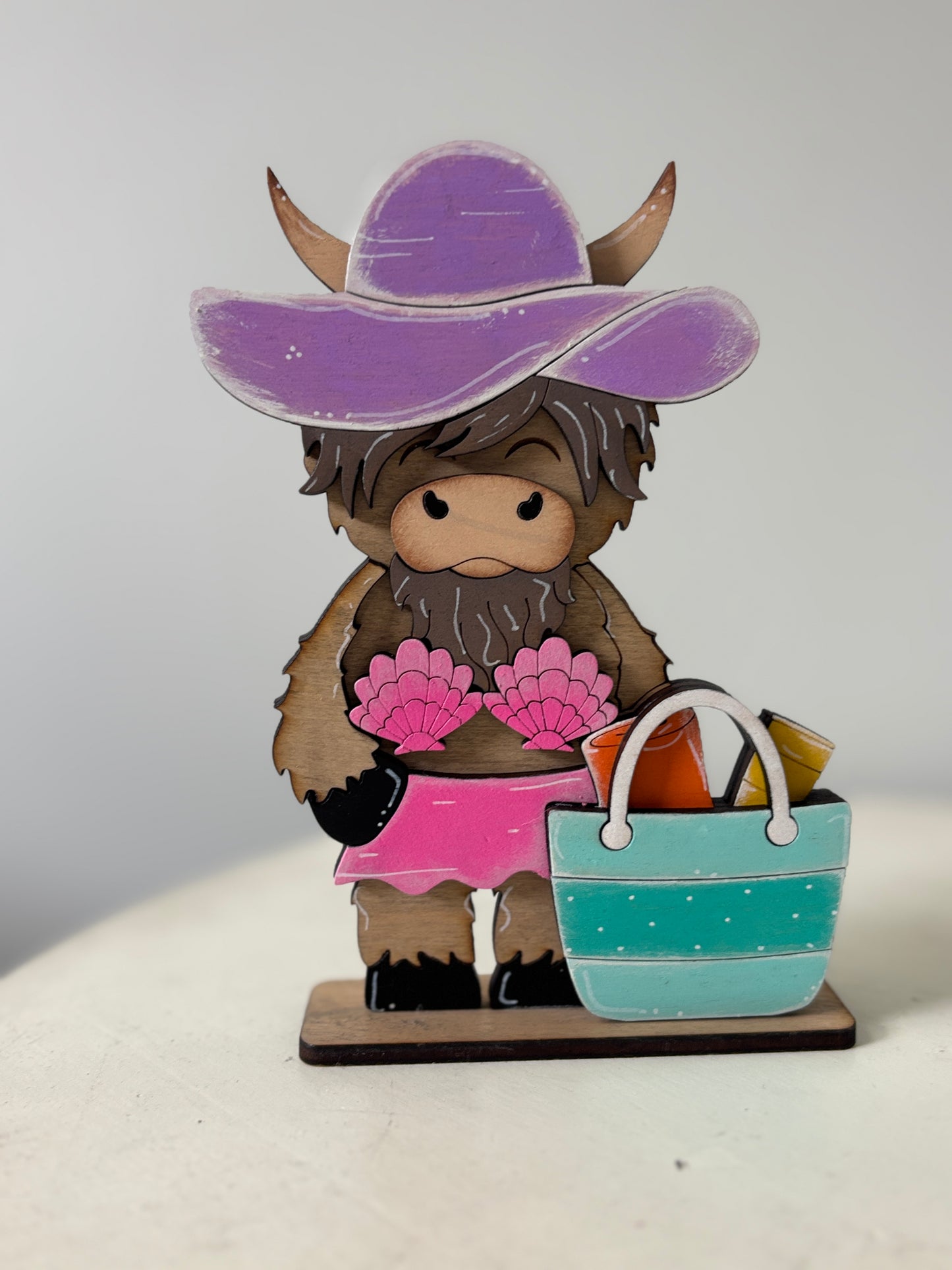 Summer mini standing highland cows