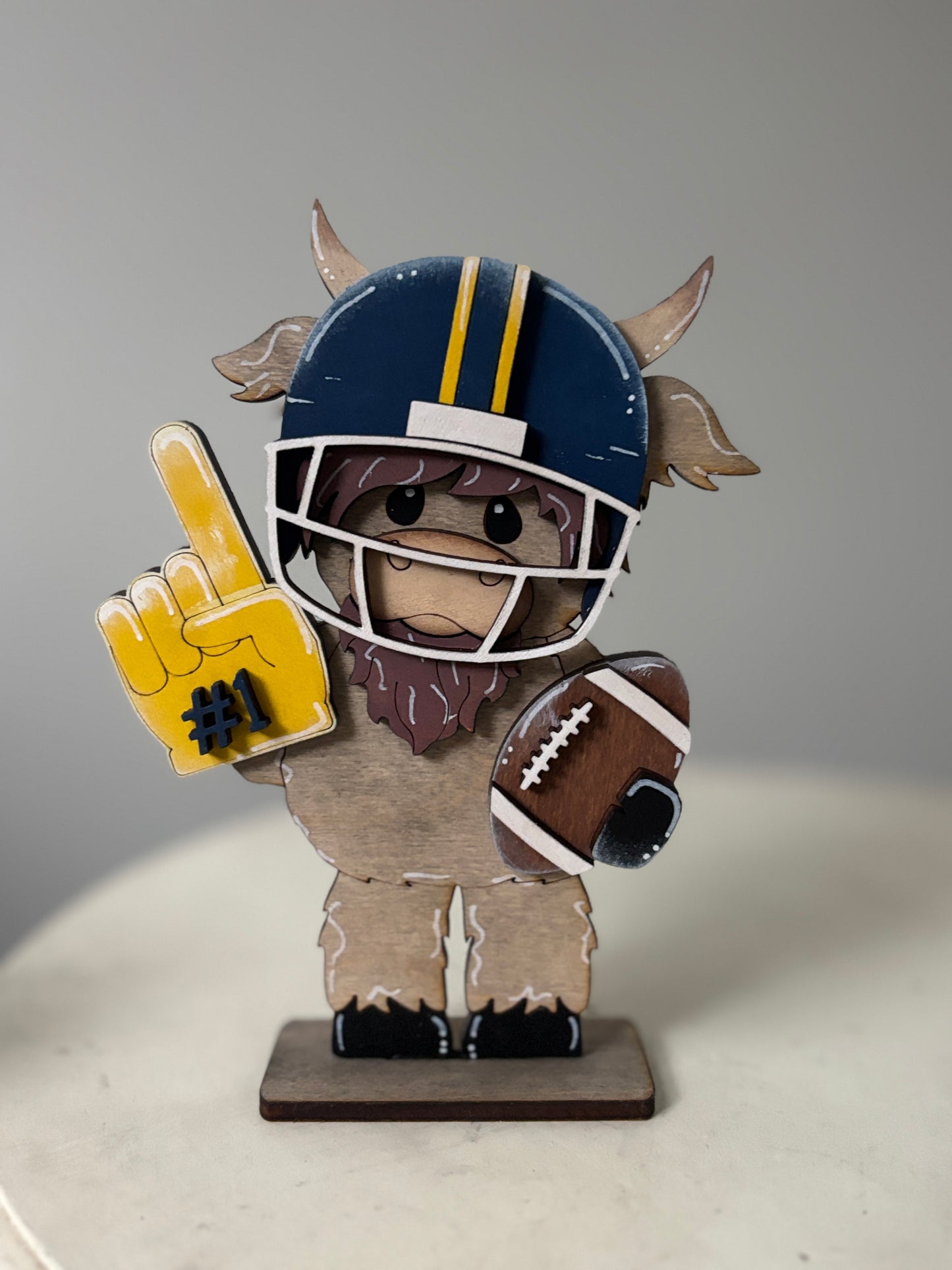 Mini standing highland cows- football & cheer