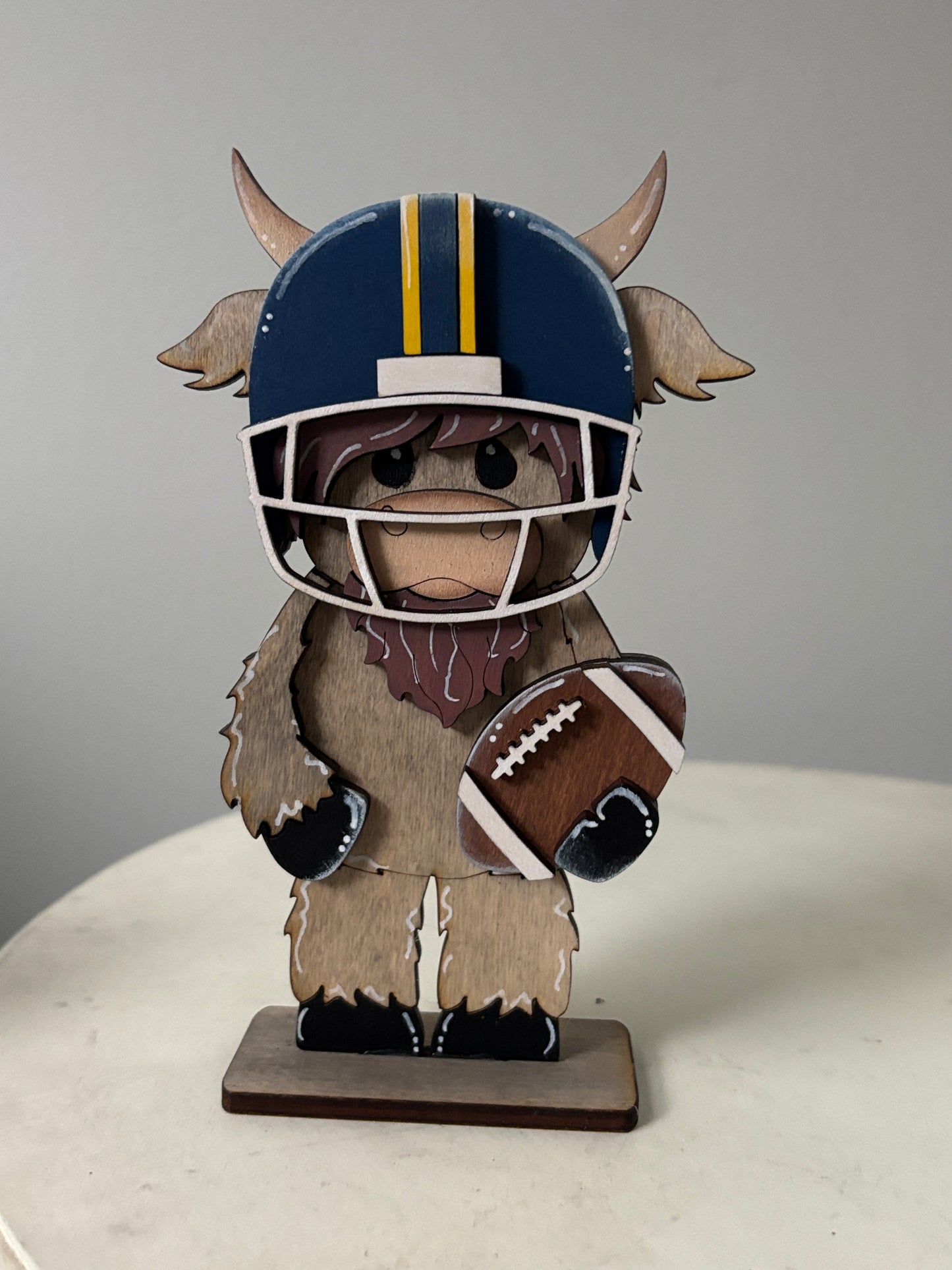 Mini standing highland cows- football & cheer