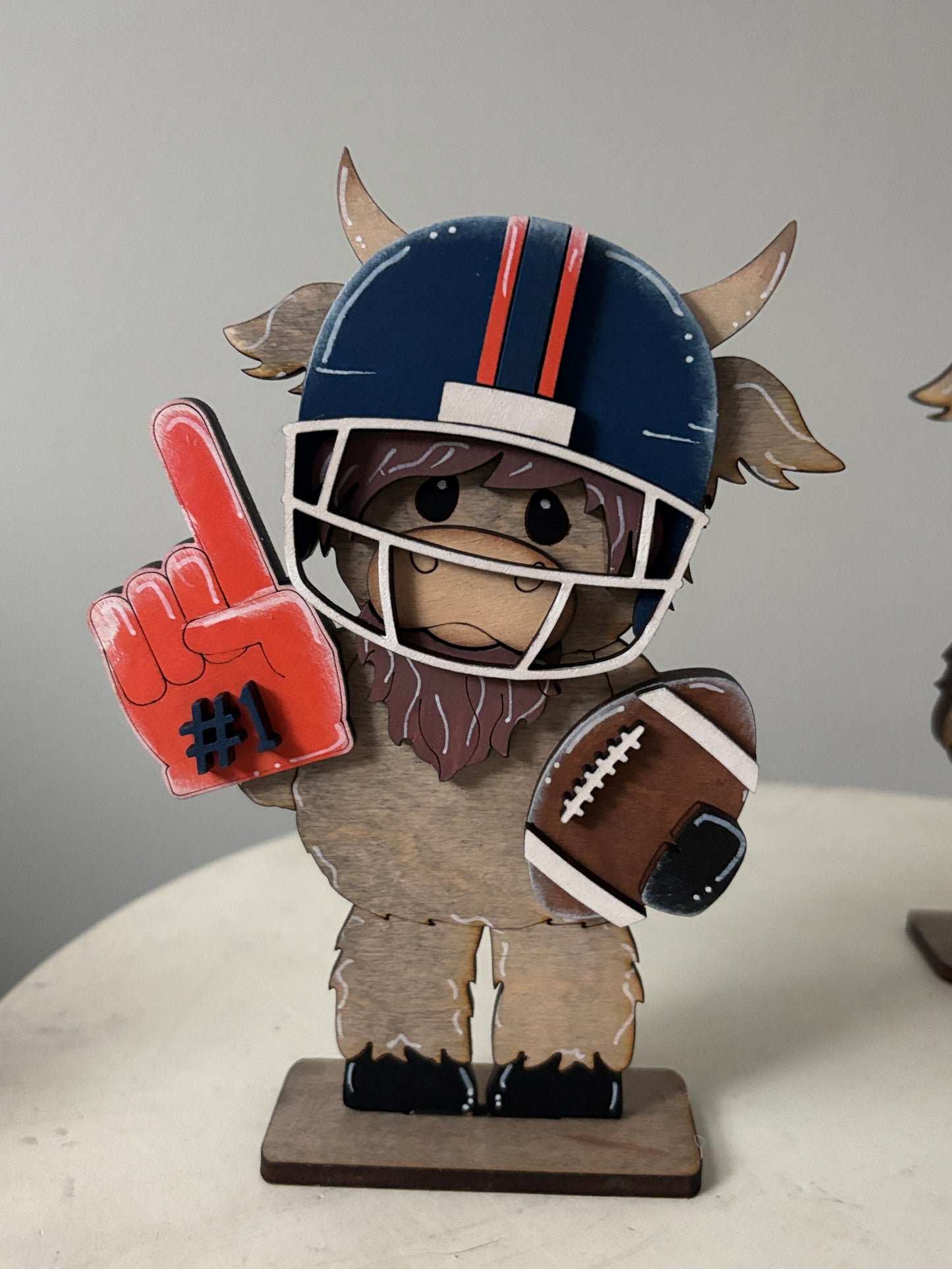 Mini standing highland cows- football & cheer