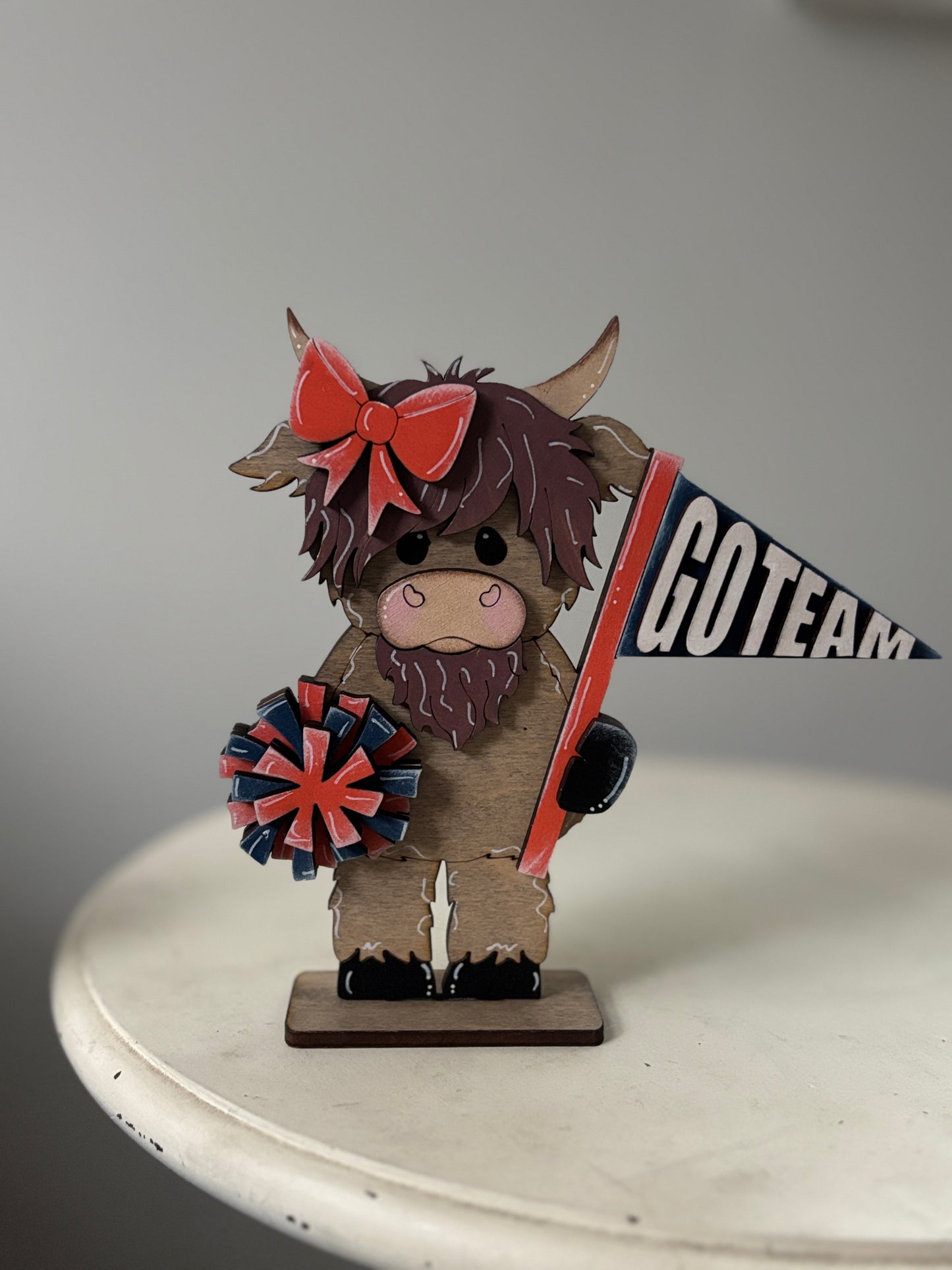 Mini standing highland cows- football & cheer