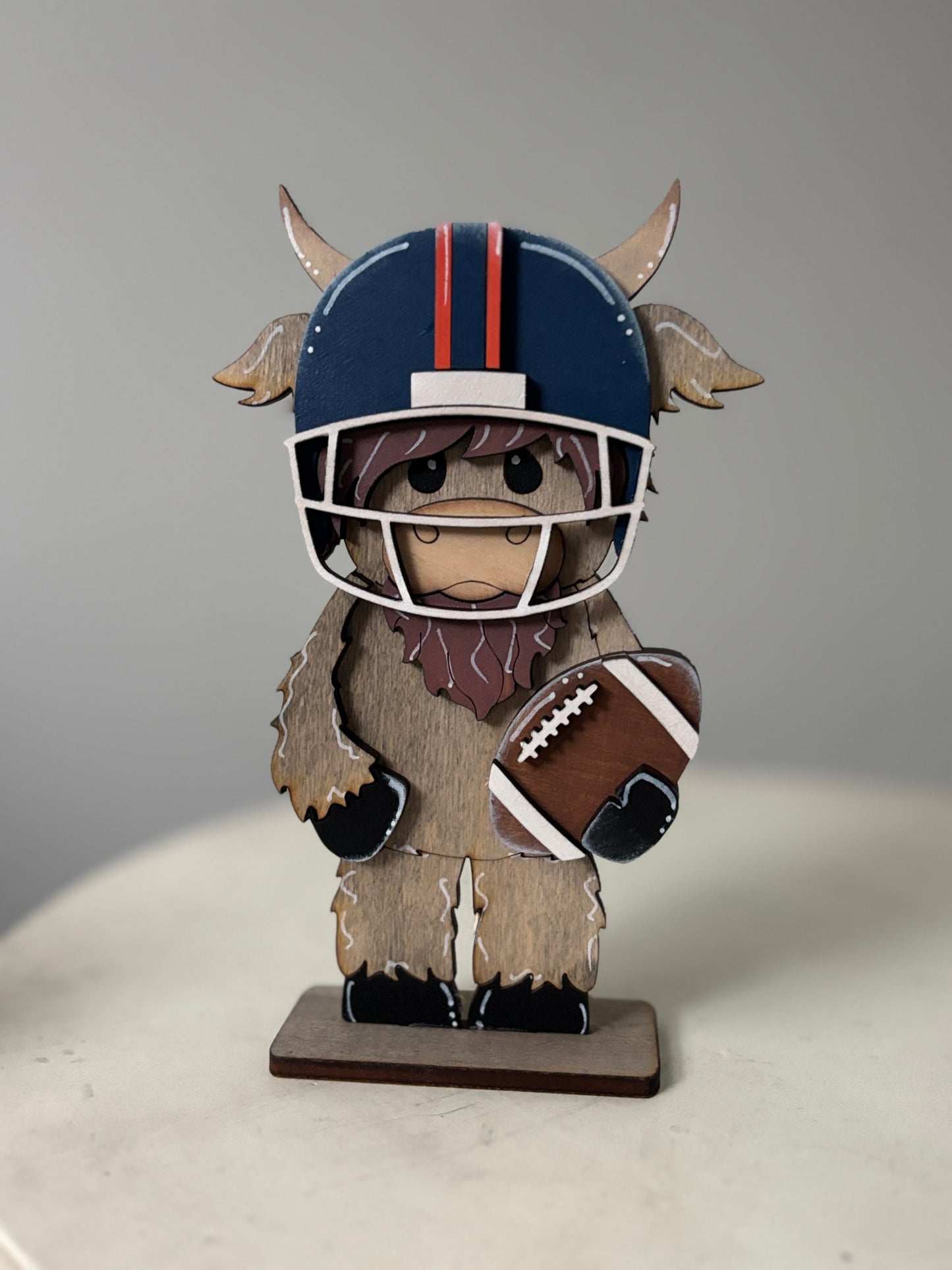 Mini standing highland cows- football & cheer