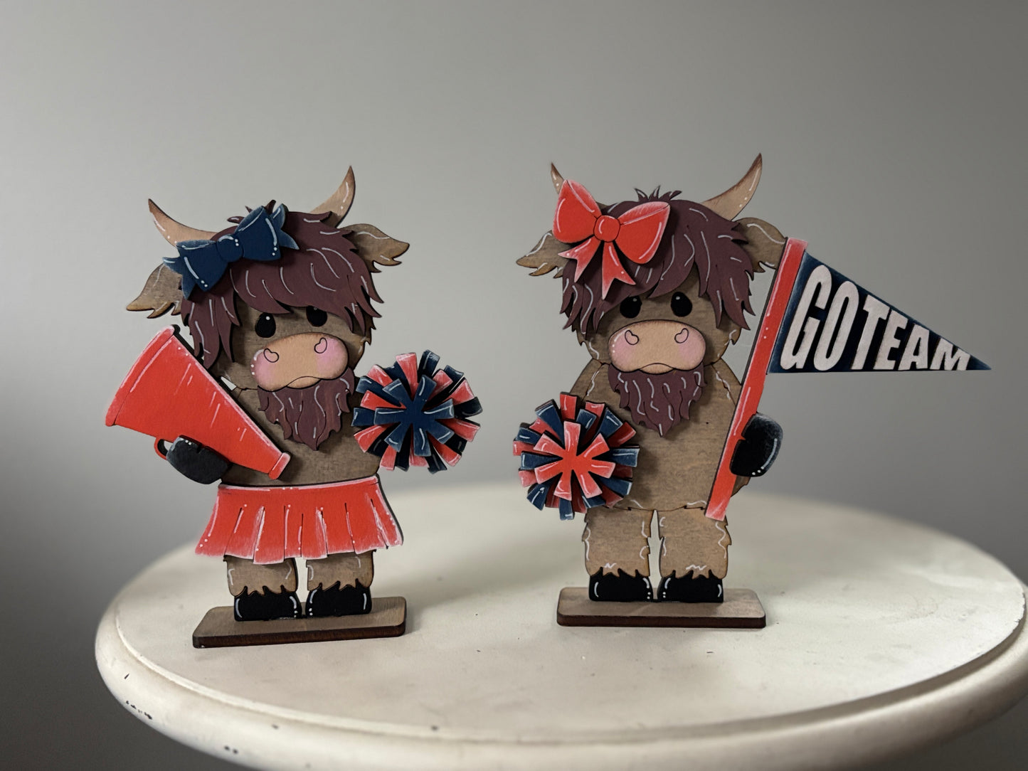 Mini standing highland cows- football & cheer