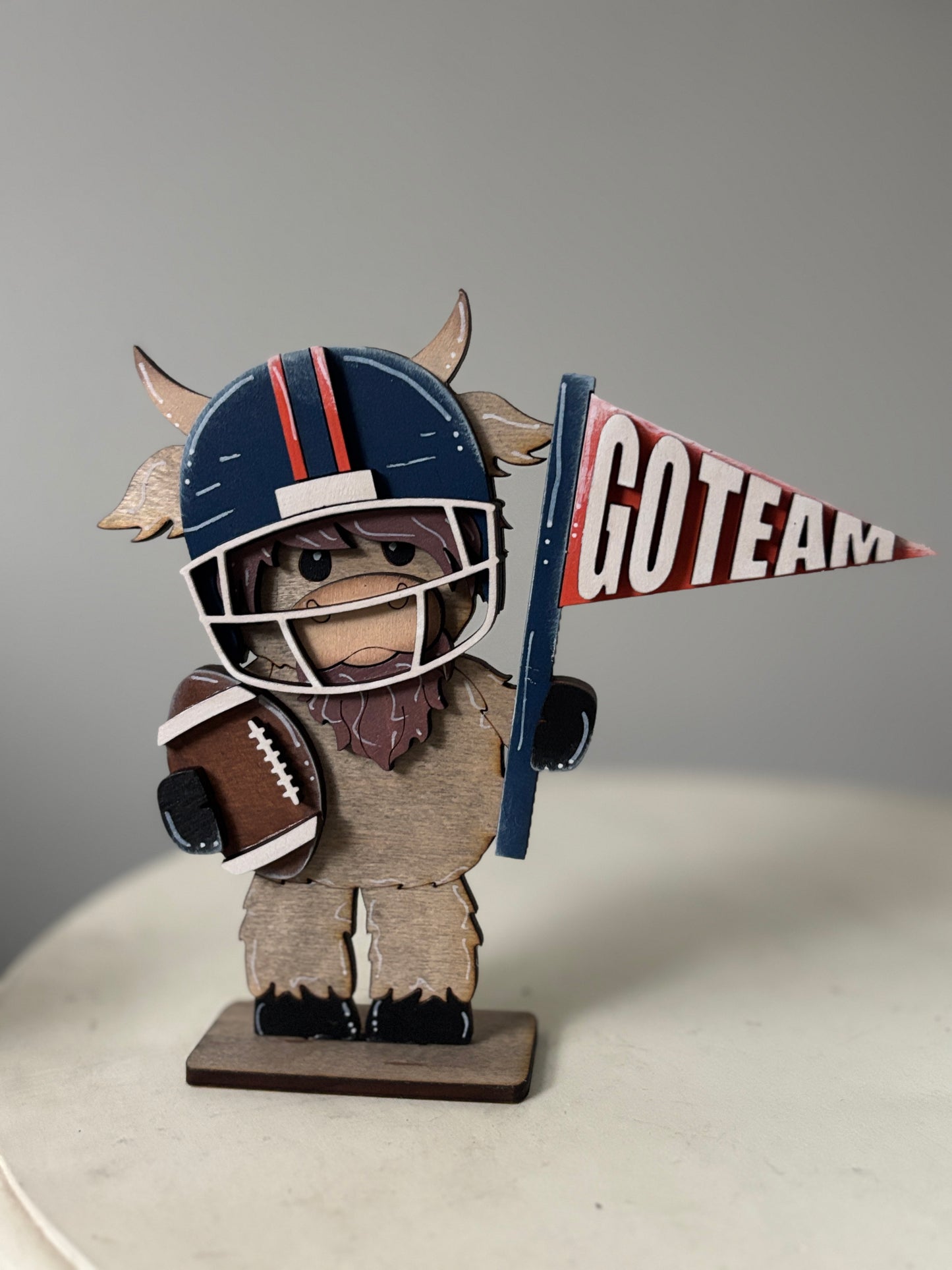 Mini standing highland cows- football & cheer