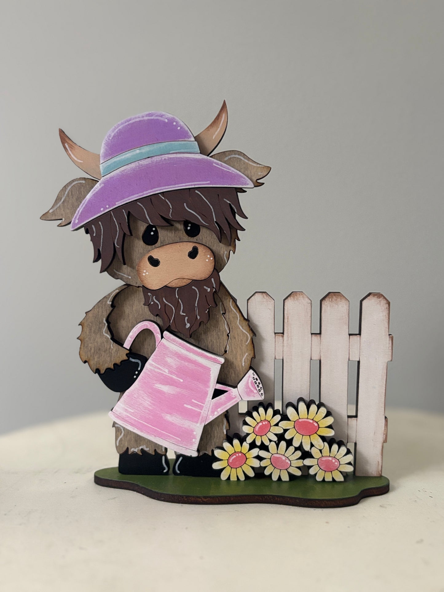 Spring mini standing highland cows