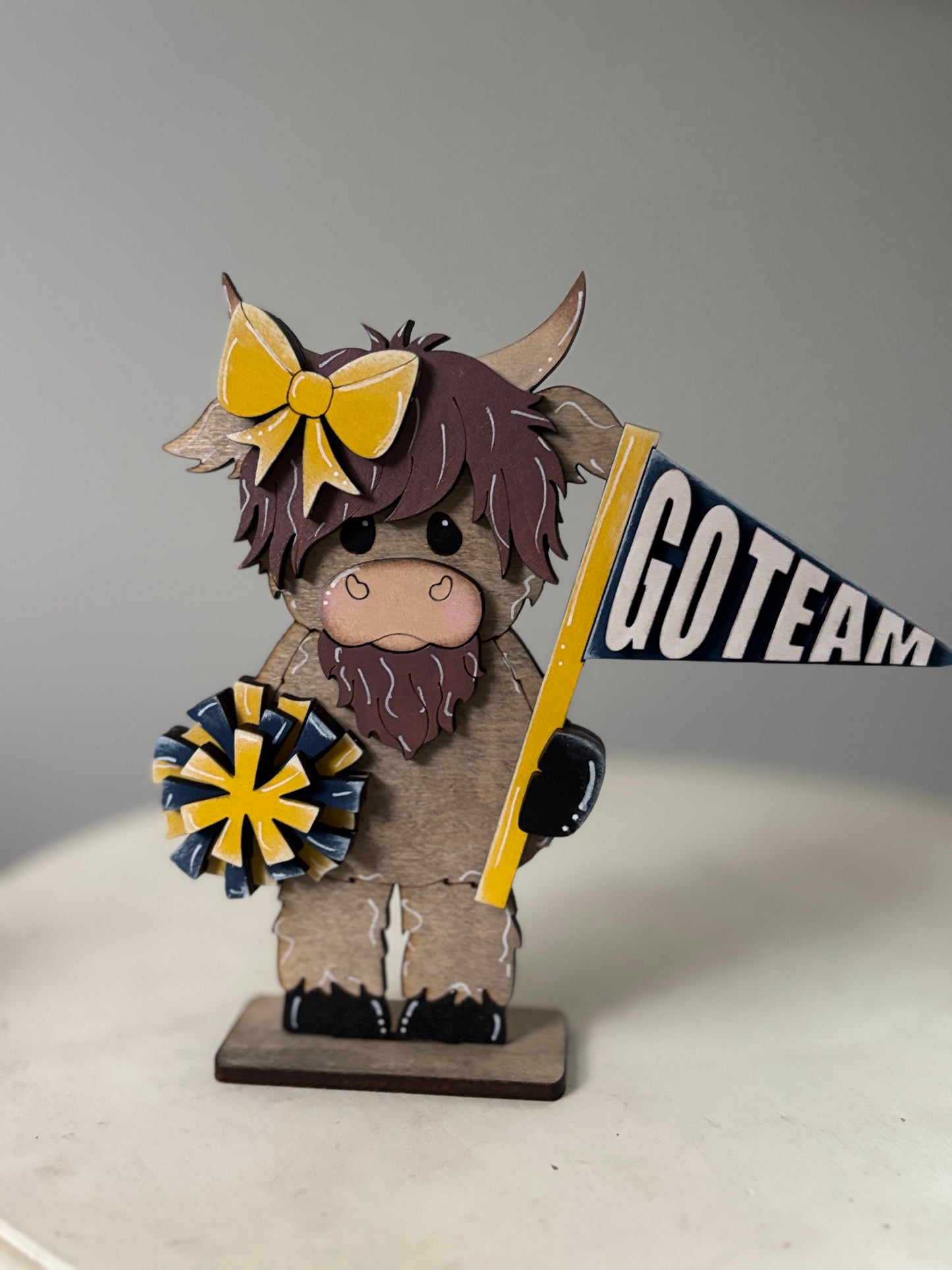 Mini standing highland cows- football & cheer