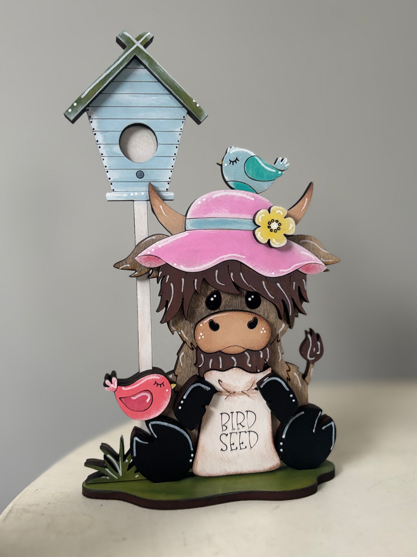 Spring mini standing highland cows