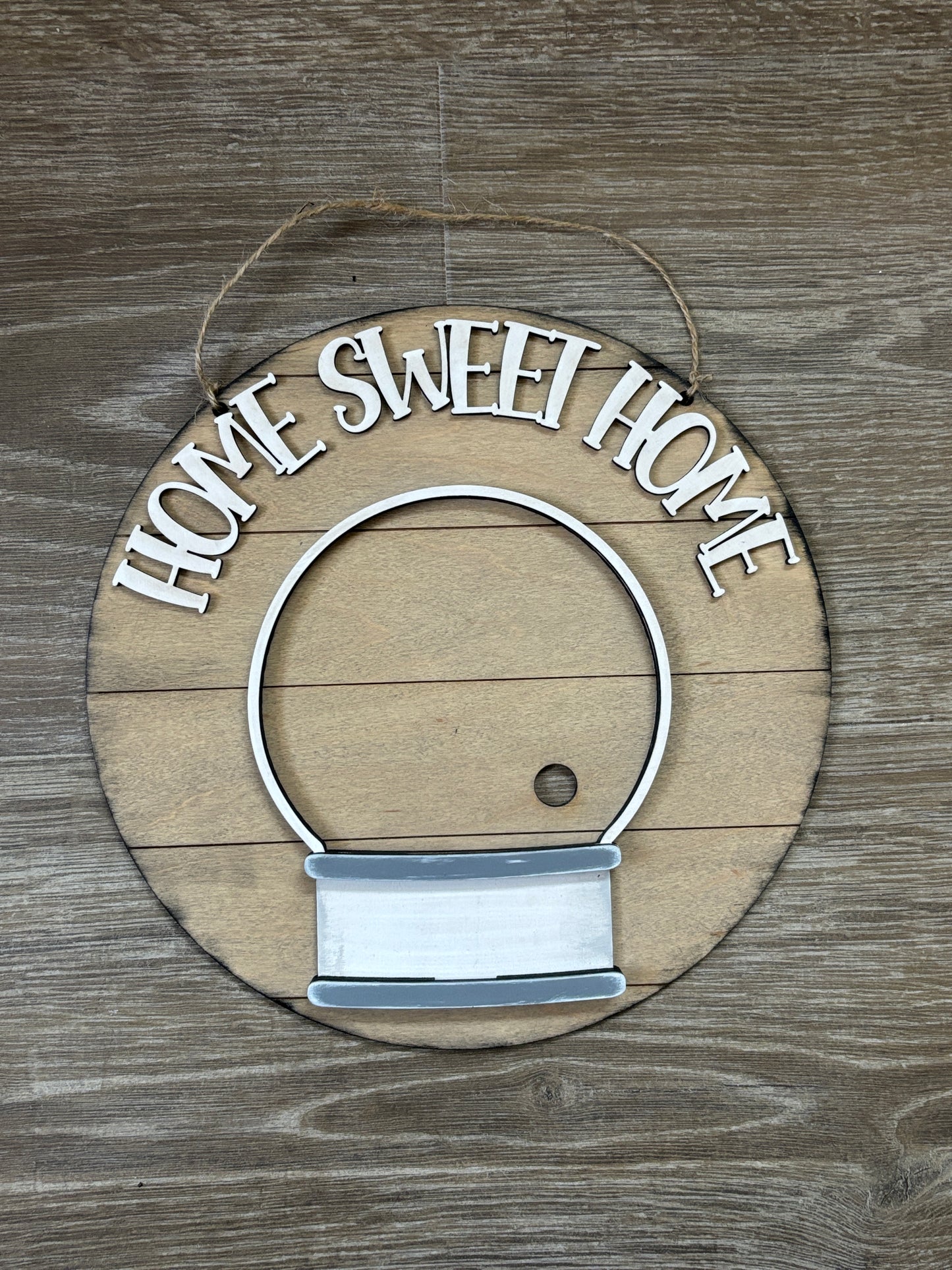Interchangeable snow globe and inserts (sold separately)