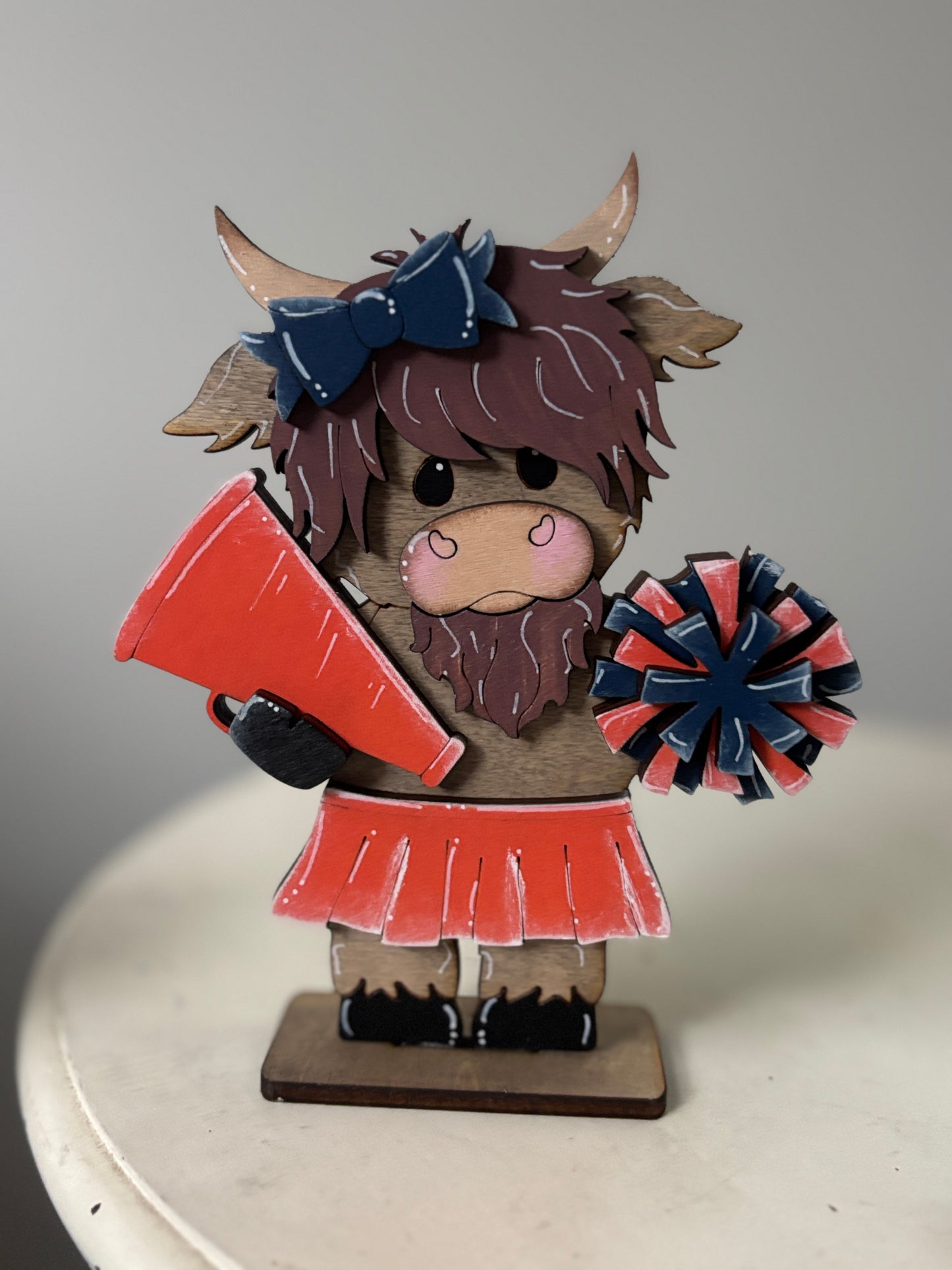 Mini standing highland cows- football & cheer
