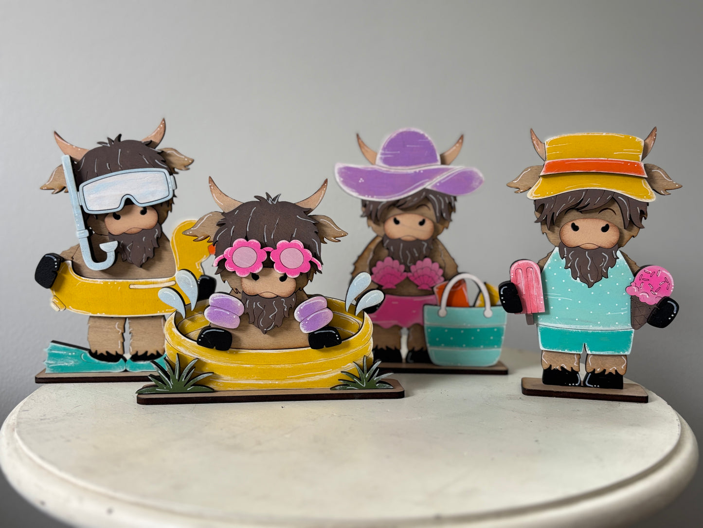 Summer mini standing highland cows