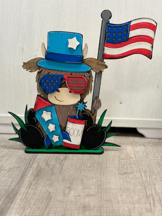 Mini sitting highland cow- July 4th