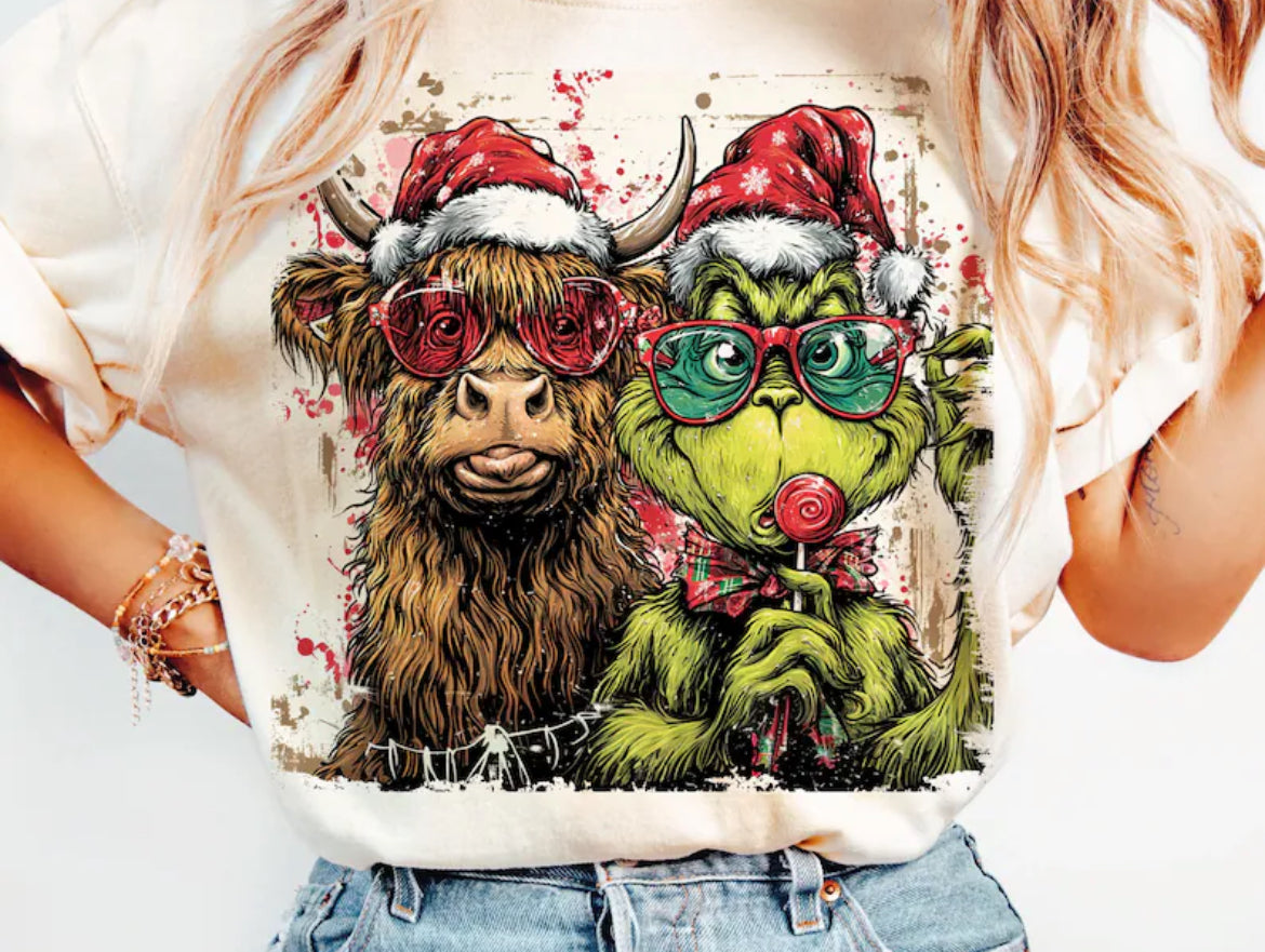 Grinch and highland cow comfort color tee